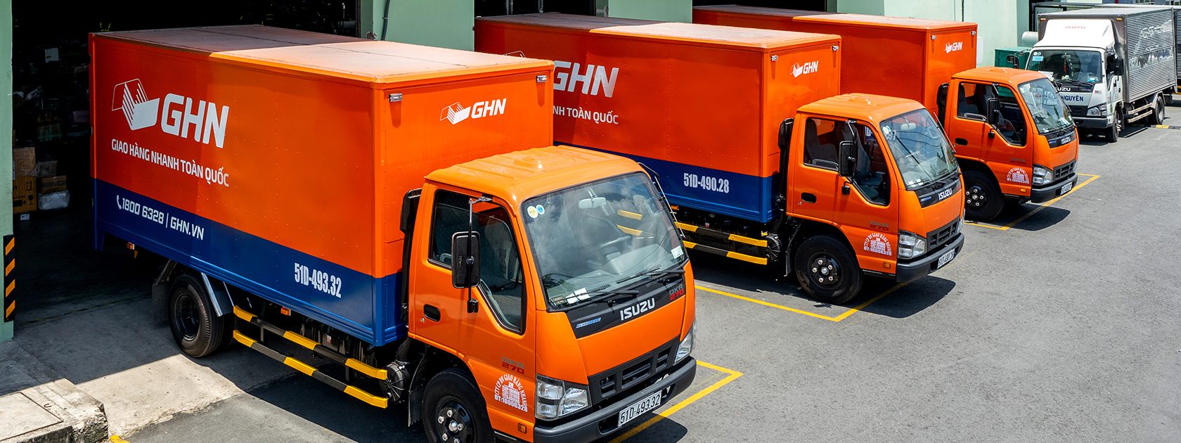 GHN orange lorries