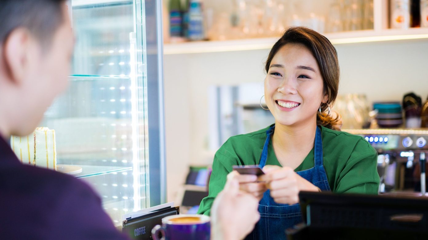Asian girl over cashier