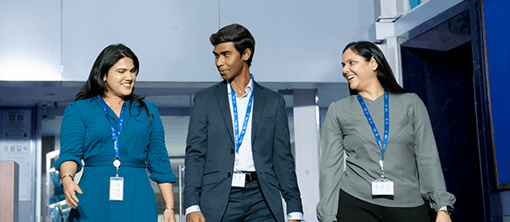 Three people walking out the office