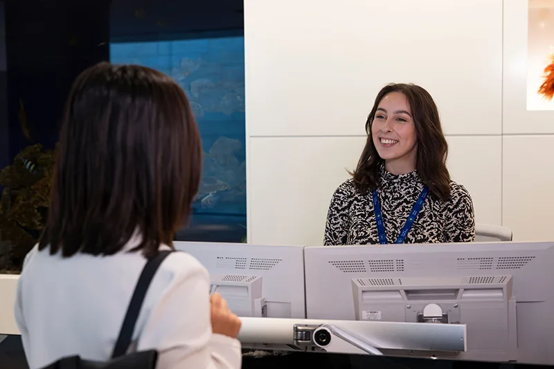 A woman smiling at office