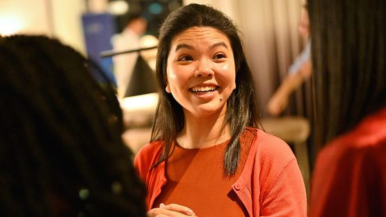 An asian girl is smiling