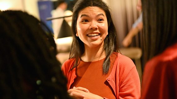 An asian girl is smiling