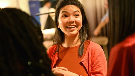 An asian girl is smiling