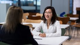 Two women talking to each other