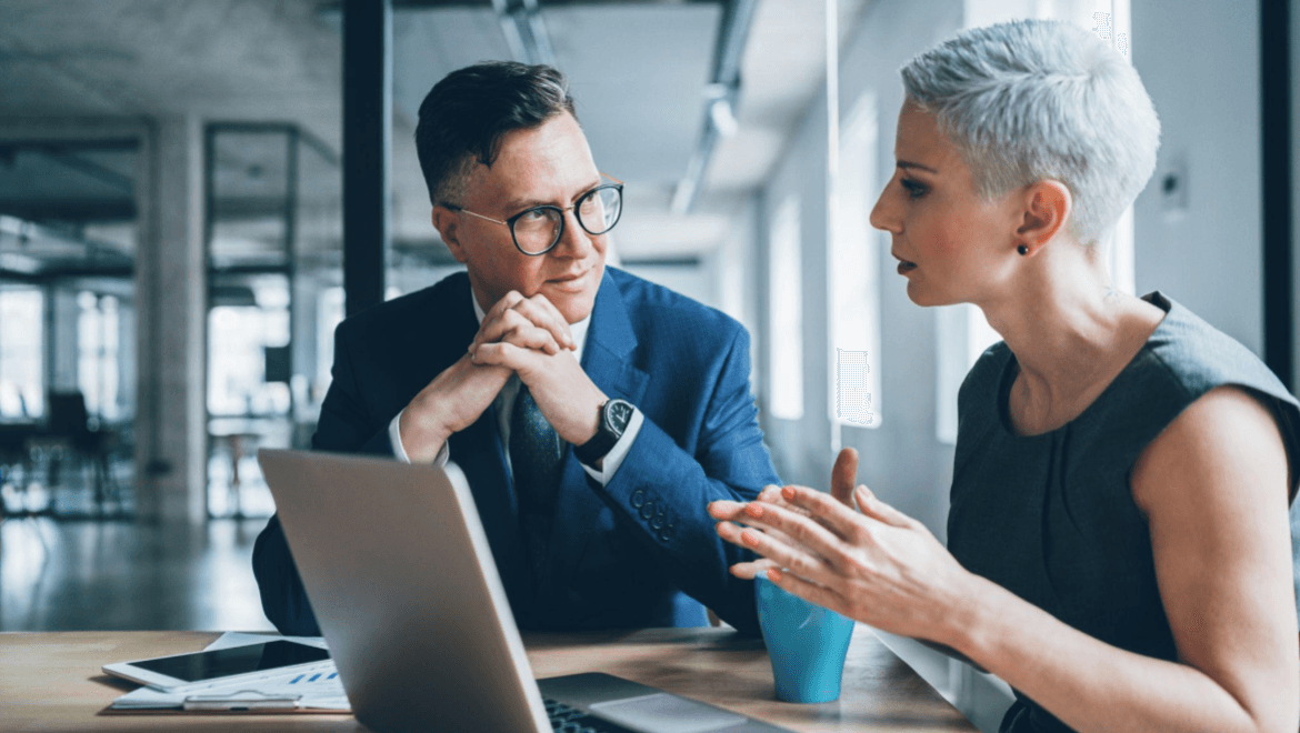 Two coworkers in a discussion
