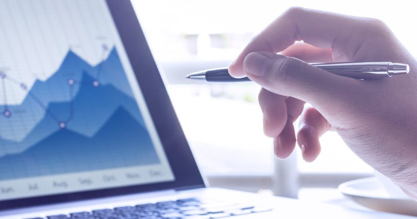 Professional looking at screen depicting liquidity management