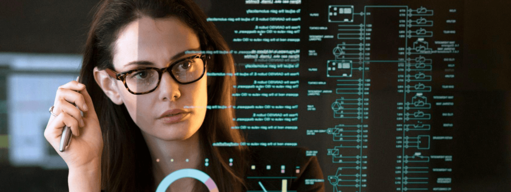 A woman reading data from a screen