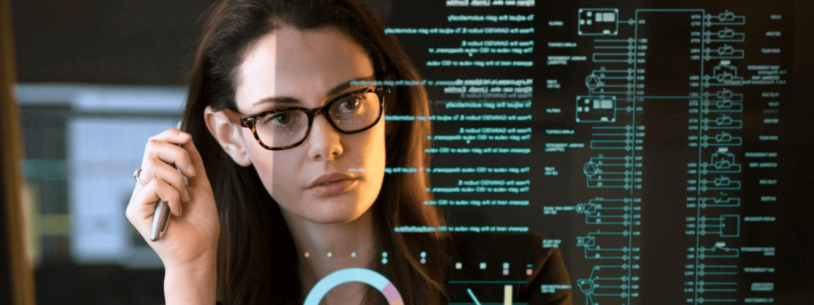 A woman reading data from a screen