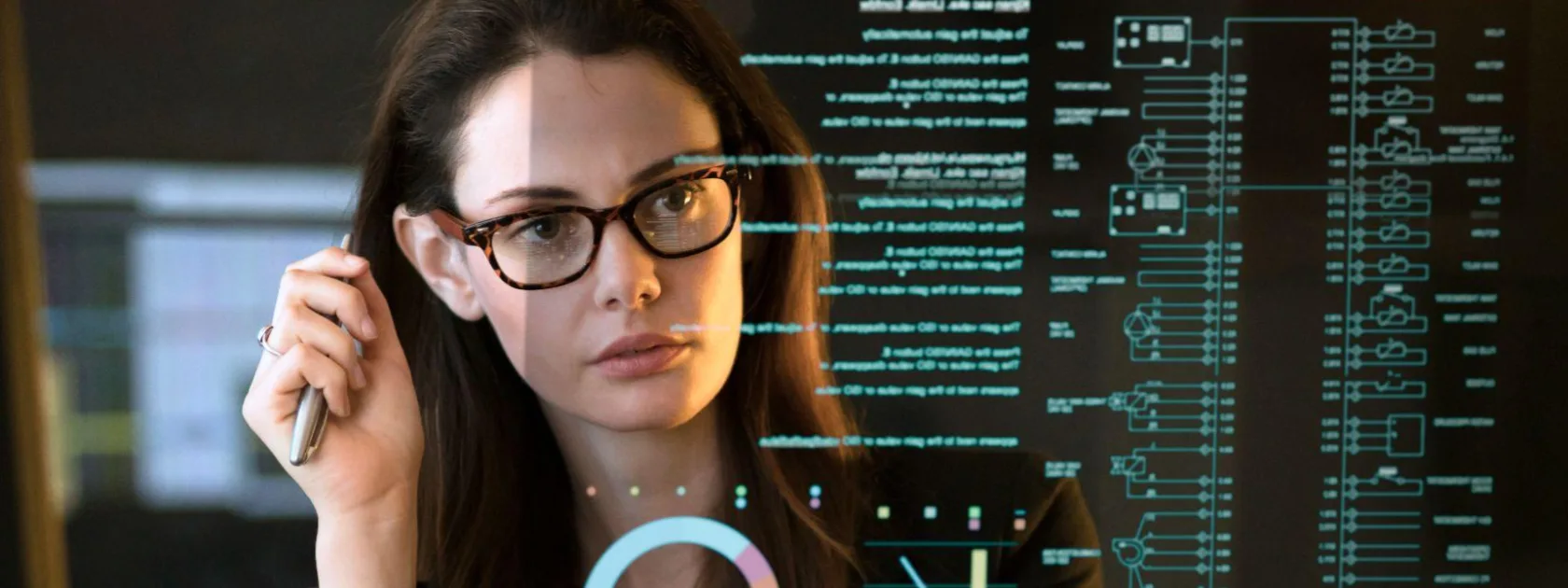 A woman reading data from a screen