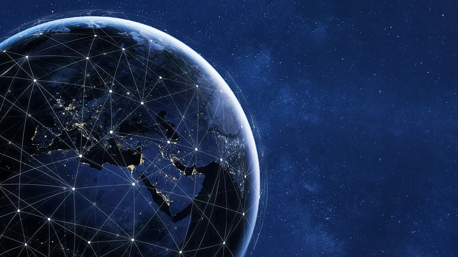 An image representing global connectivity around the globe with glowing lines