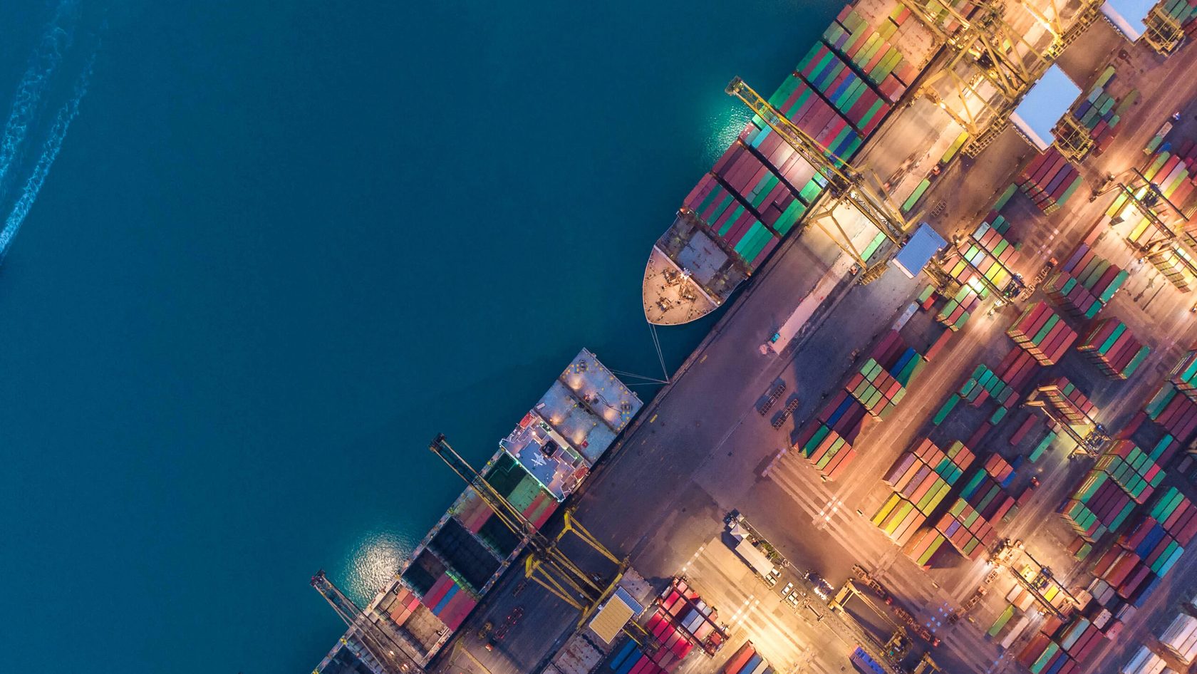 Cargo ships with containers in a port, depicting the supply chain in maritime/shipping