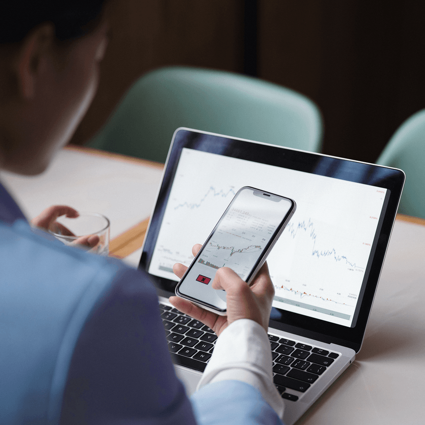 Woman with a phone and laptop 