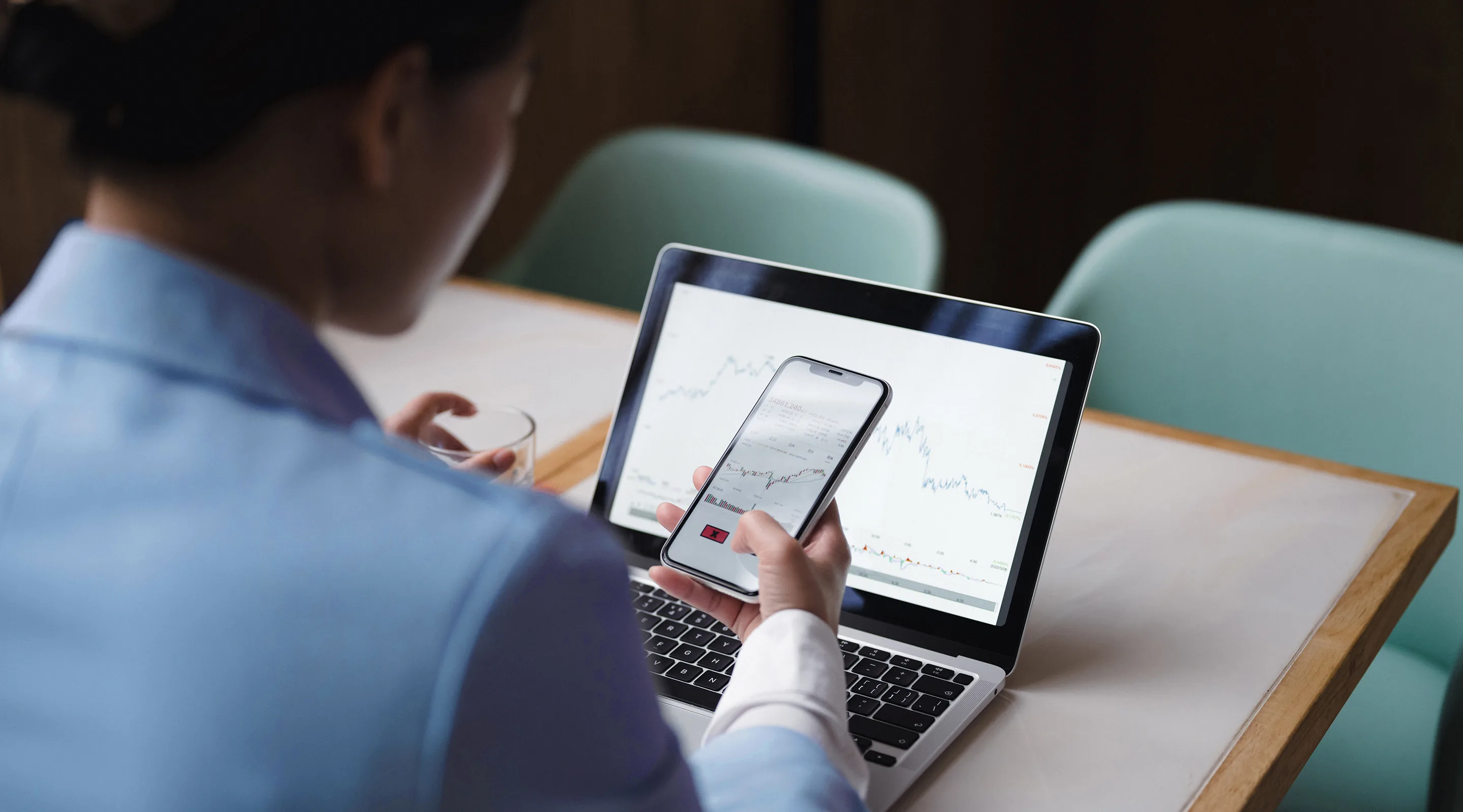 Woman with a phone and laptop 