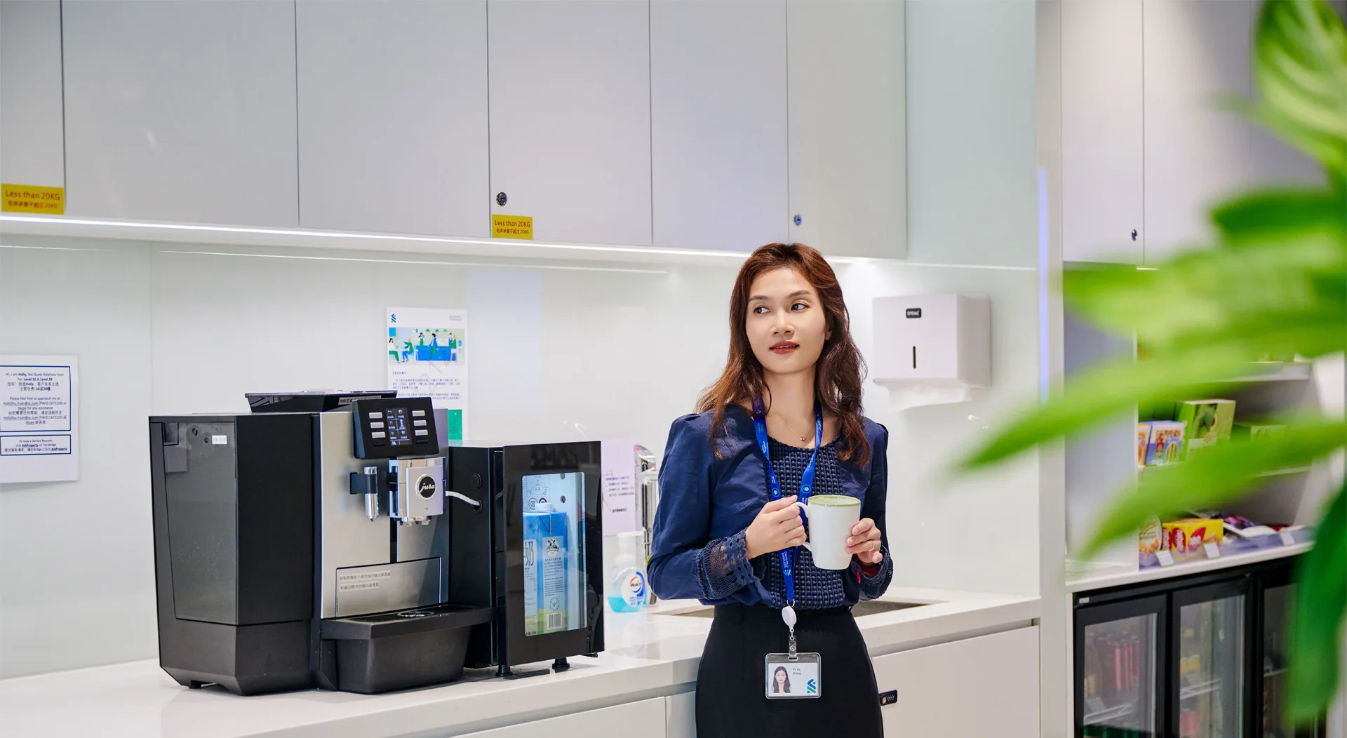 Woman having coffee at work 