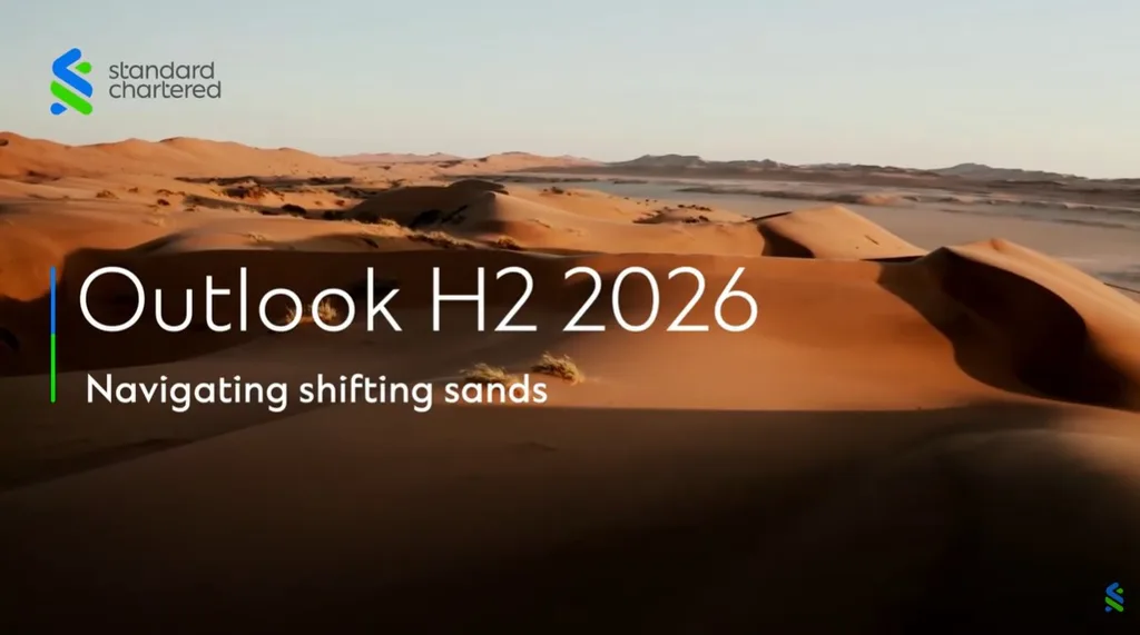 A screen capture of sand dune with Standard Chartered H2 2026 Outlook text on image