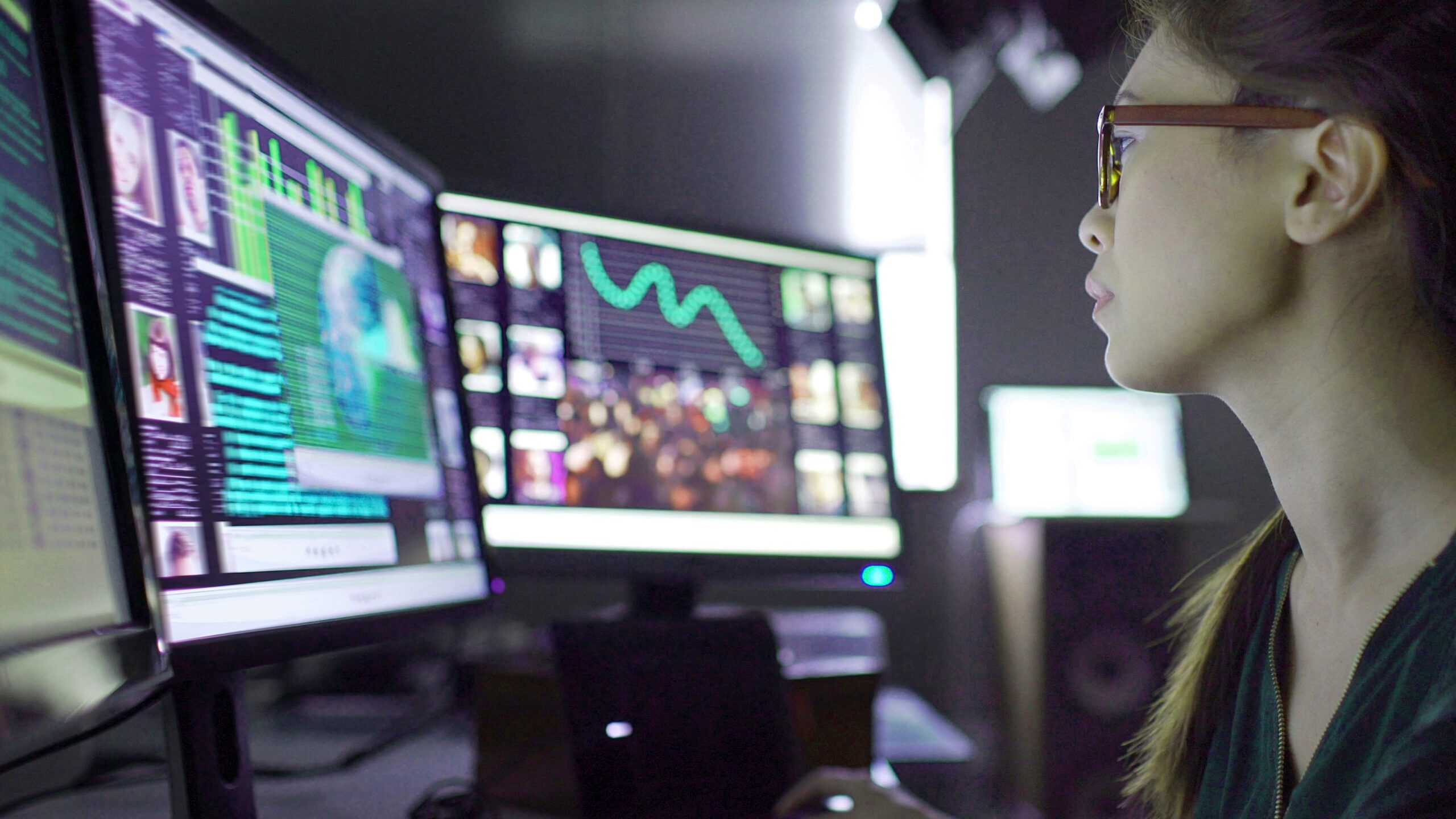 Man looking at computer monitoring for cyber security threats