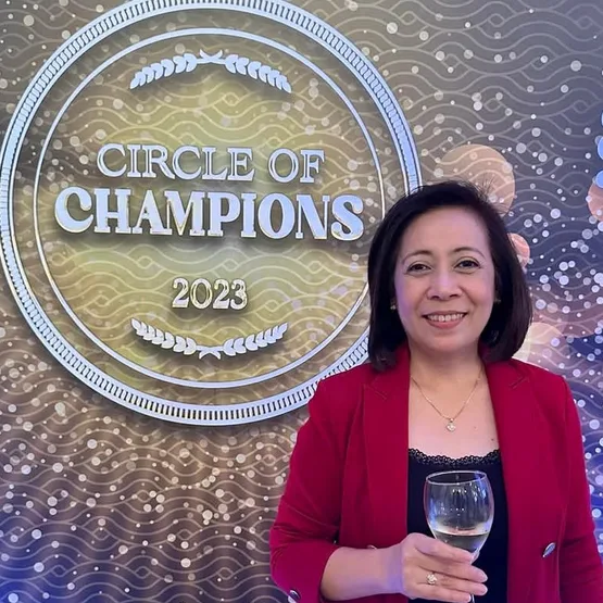 A portrait of Jane at an awards ceremony.