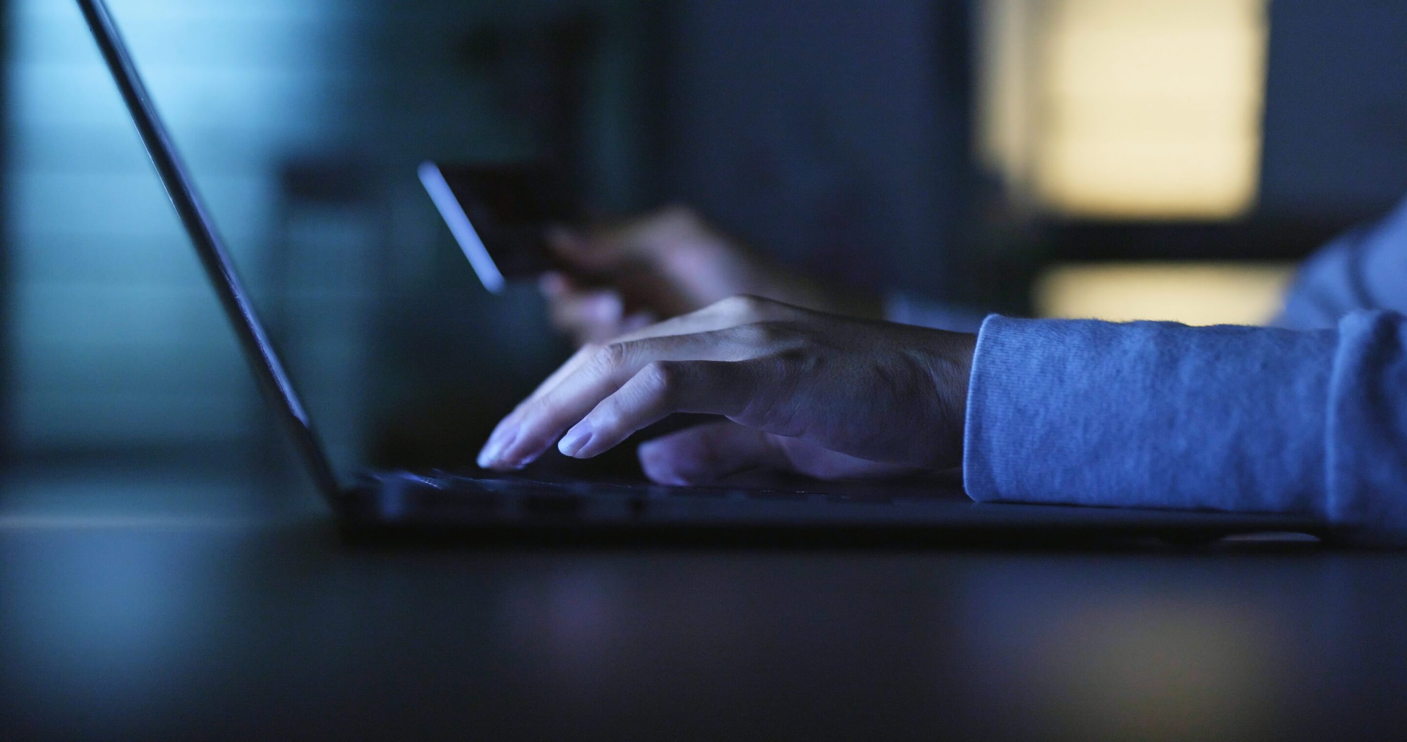 Closeup of a person using a laptop