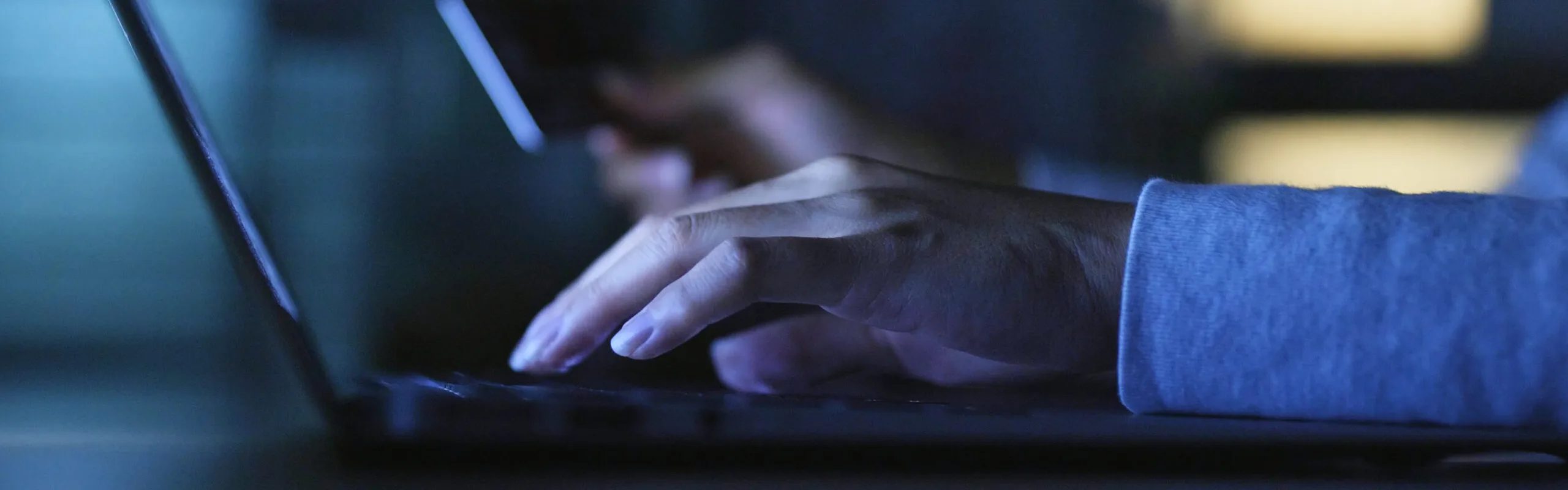Closeup of a person using a laptop