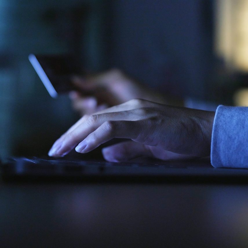 Closeup of a person using a laptop