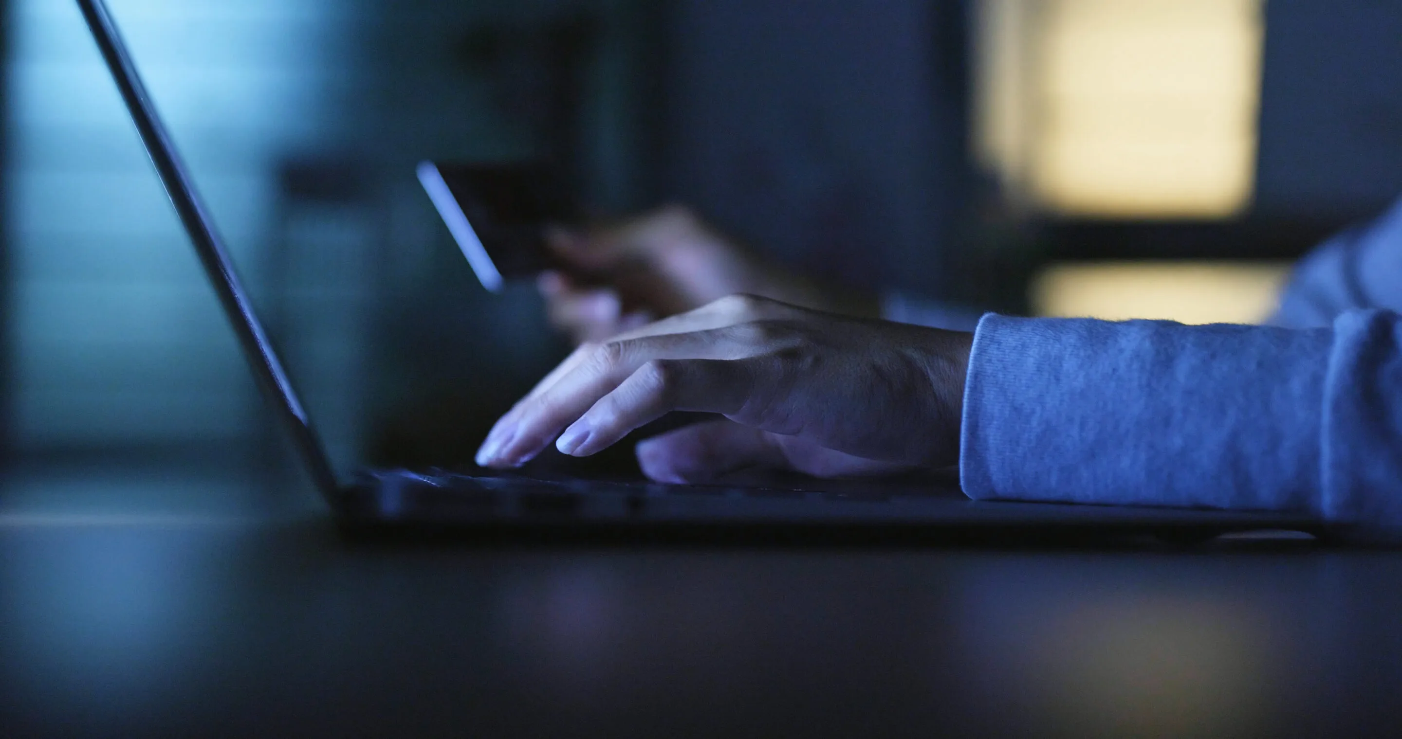 Closeup of a person using a laptop