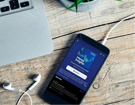 A phone playing a podcast