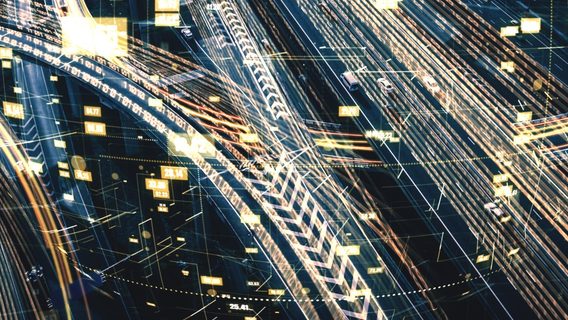 aerial view of interconnecting highway roads with digital vector overlays