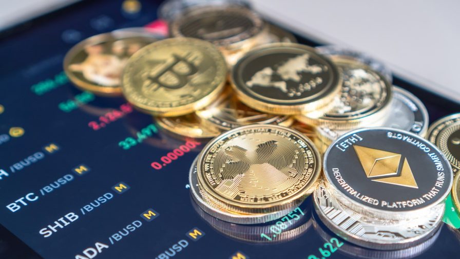 pile of coins on a digital device