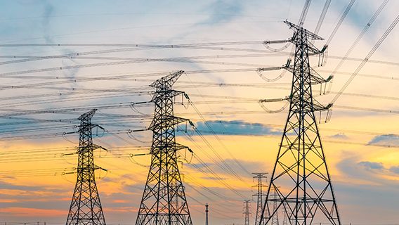 power lines against sunset