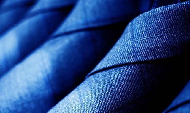 macro image of row of suits mobile version