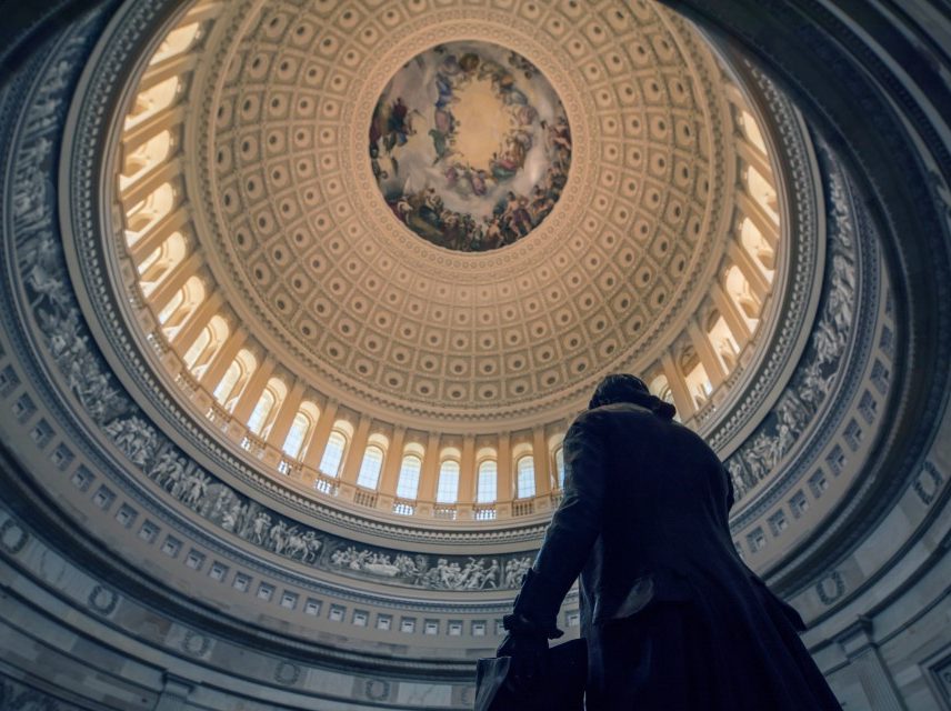capitol building interior with statue and rotunda
