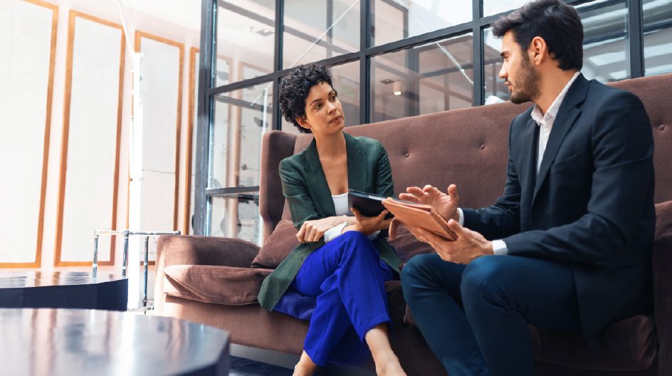Two people in a meeting