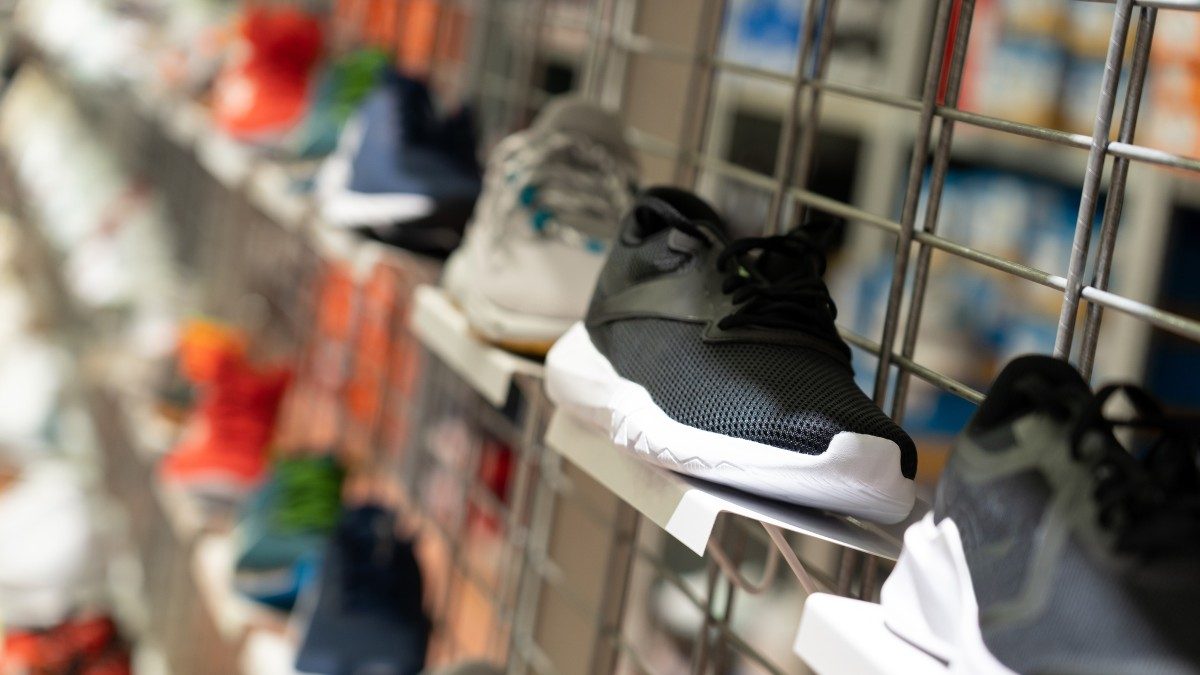 close-up image of a retail shelf with shoes