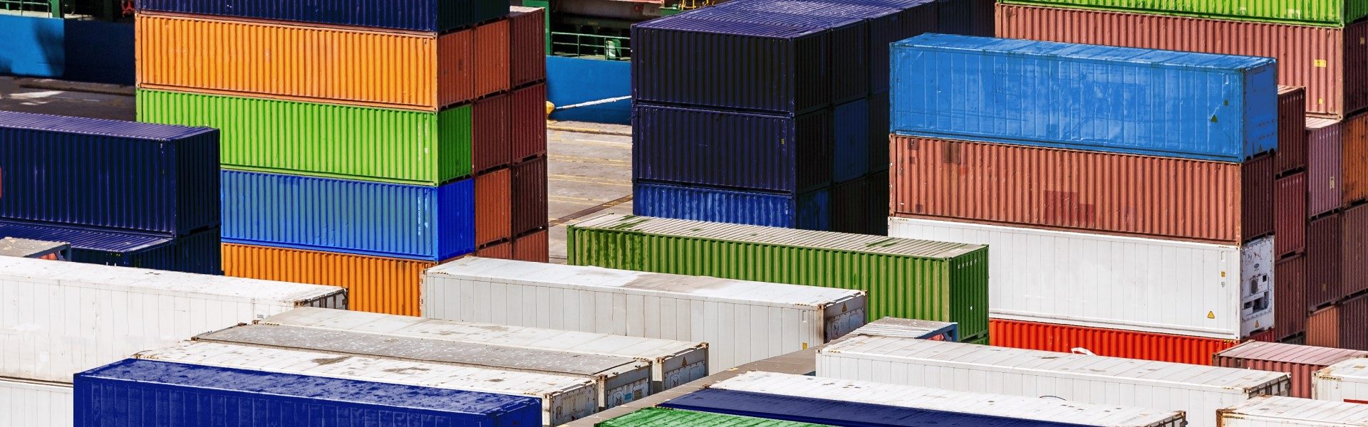 stacks of container boxes in a port