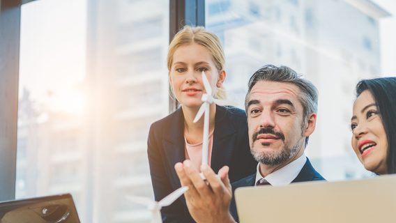 image of 3 business people in a discussion