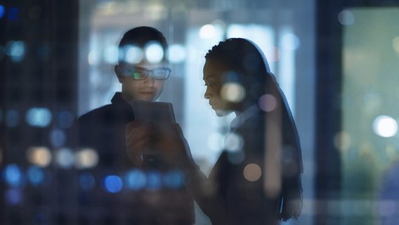 2 people in discussion