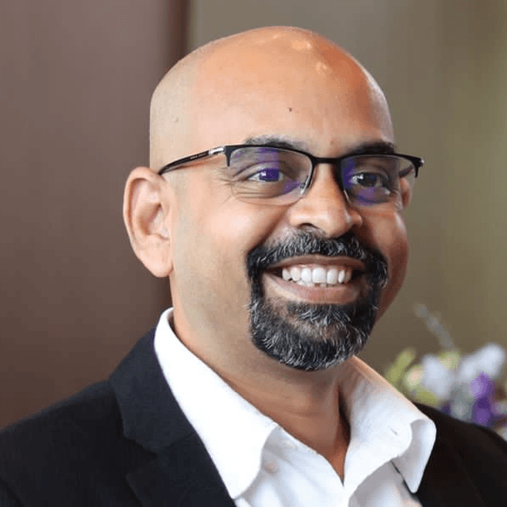 A portrait image of Senthil