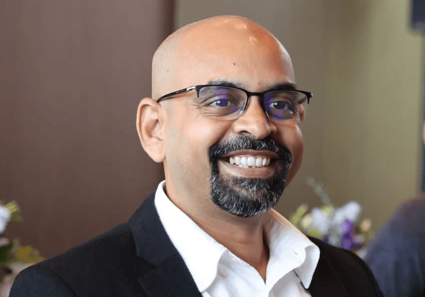 A portrait image of Senthil