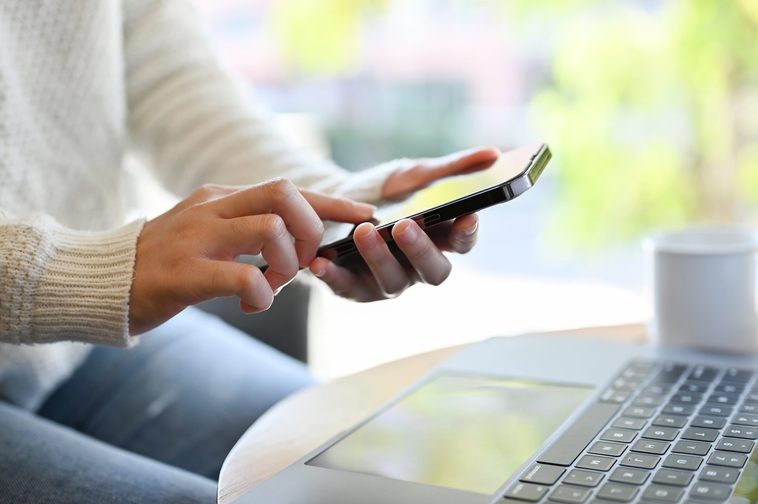 A female using her mobile 
