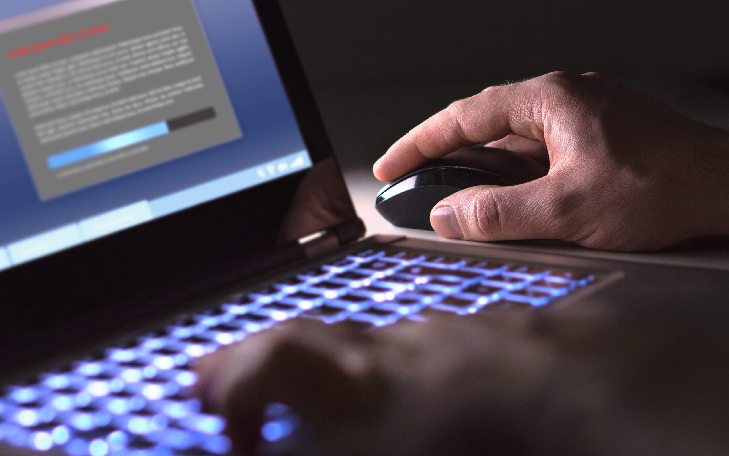 man at laptop_fraud