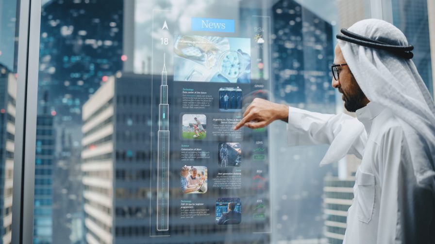 Businessman using futuristic computer