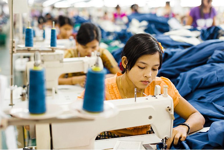 Image of women sewing