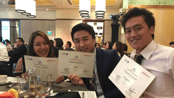 Walter with colleagues at a table 