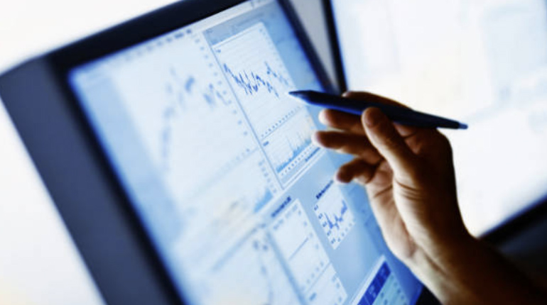 Computer screen showing graphs on technology in treasury