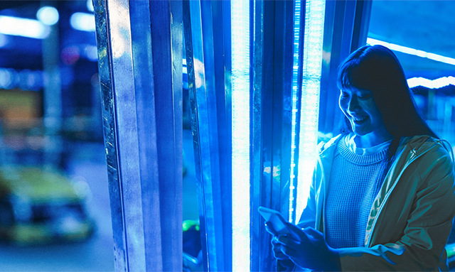 Asian girl looking at mobile phone