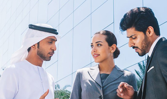 Clients meet a rep outside a wealth centre.
