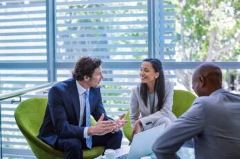 Businessman discussing strategy with colleague