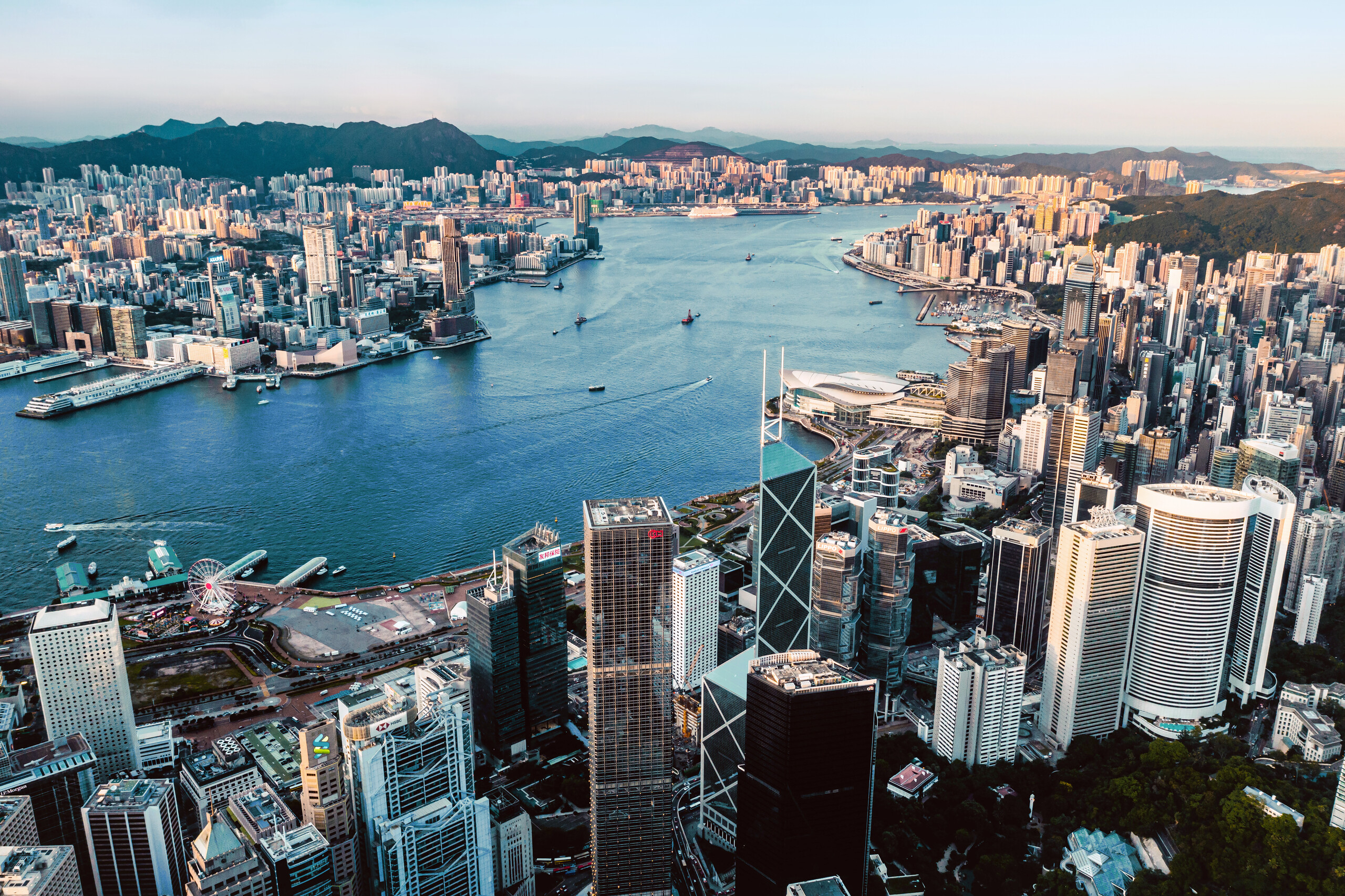 Victoria harbour of Hong Kong at sunset.